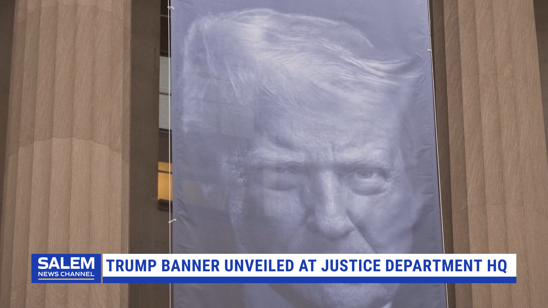 Trump banner unveiled at Justice Department HQ