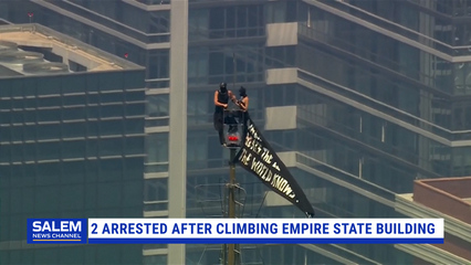 2 Arrested After Hanging Banner On Empire State Building Antenna